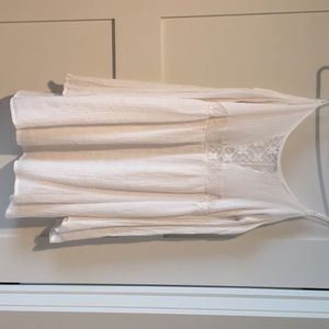 A white off the shoulder dress